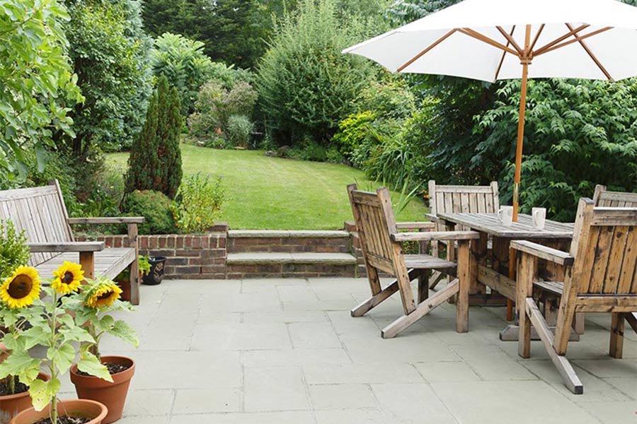 concrete patio leading to rest of yard